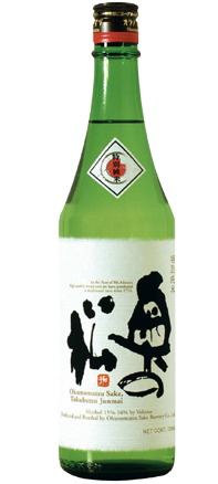 Green bottle of Japanese sake with label.